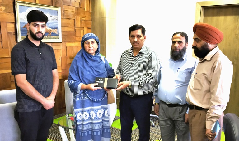 JK Bank Chairman and MD hands out insurance payout to the family of de…