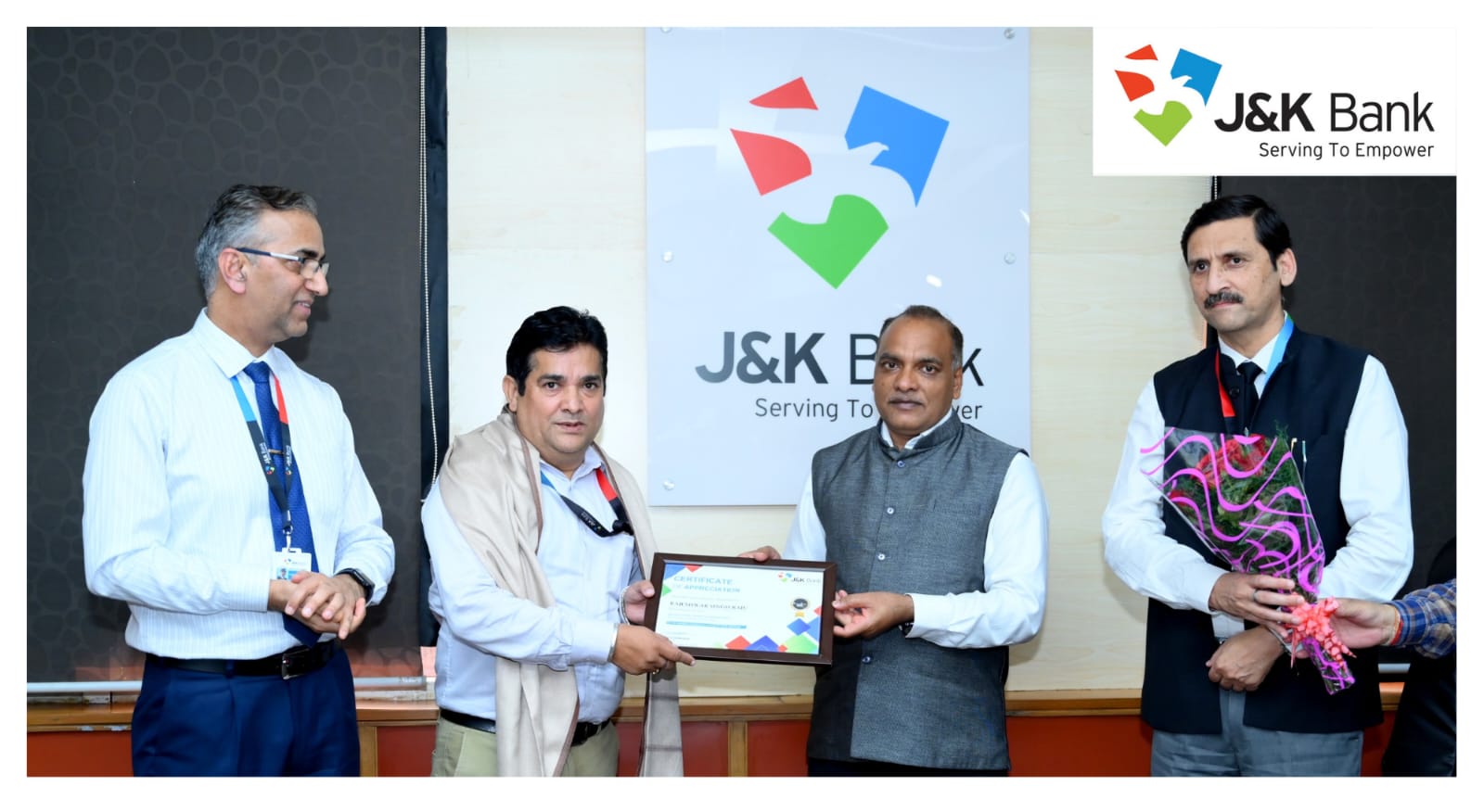 J&K Bank MD felicitates staff member