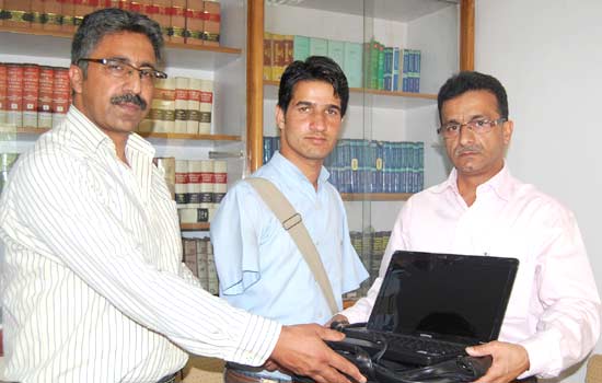 J&K Bank donates laptop to disabled student J&K Bank donates laptop to disabled student